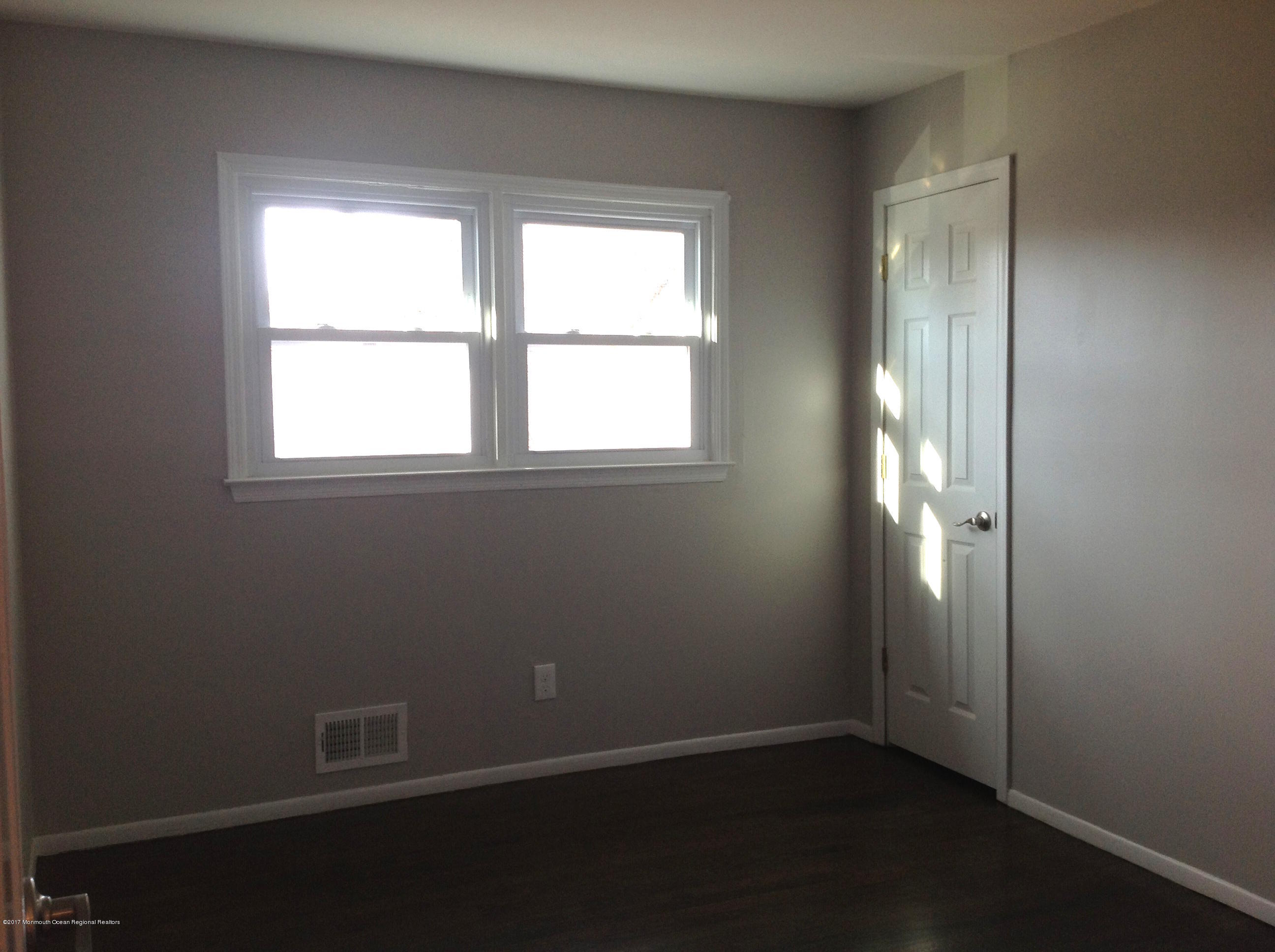 10 Carriage Road North Hazlet, NJ 07730 - Photo 13 of 24 an empty room with a window