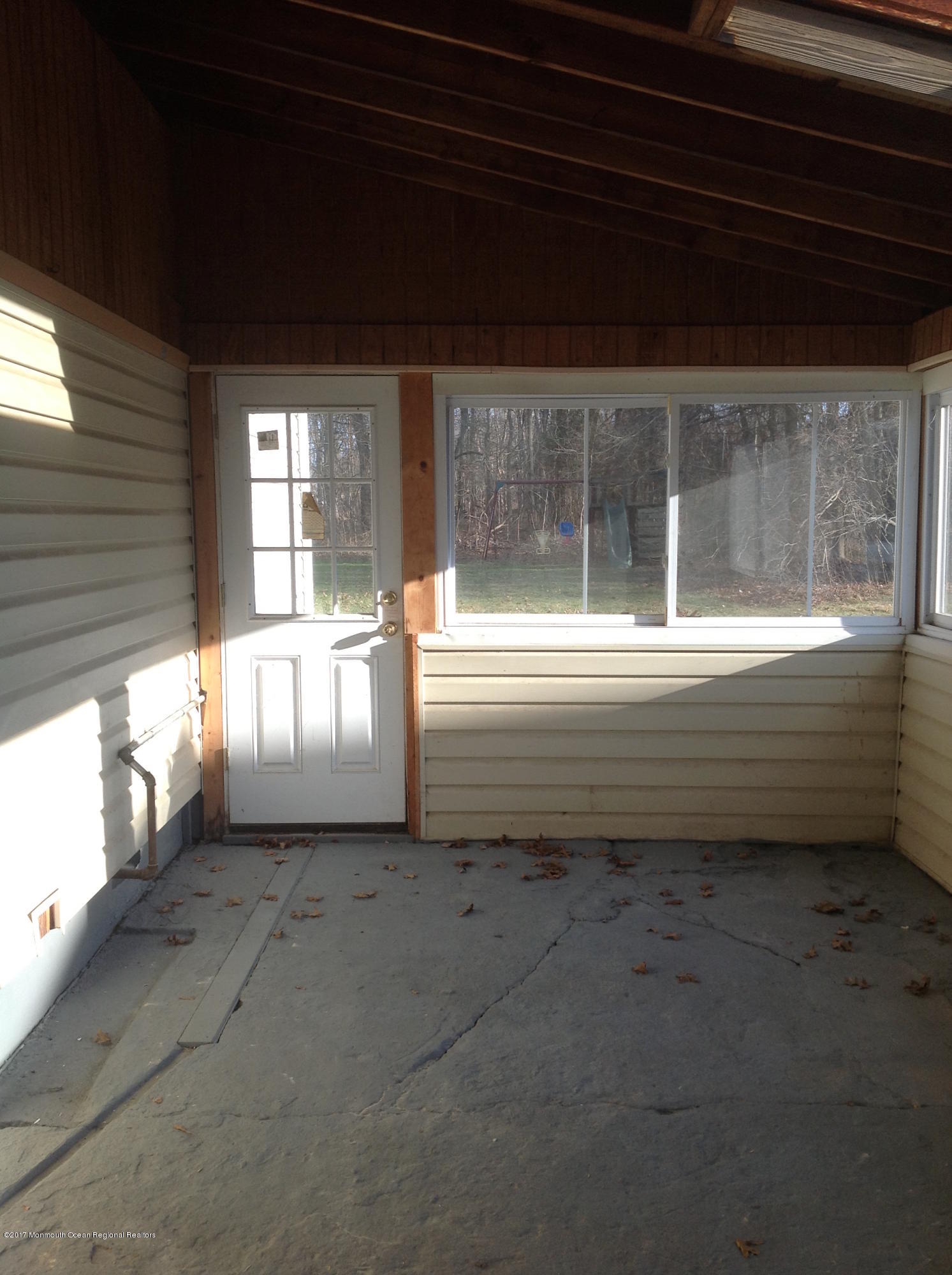 10 Carriage Road North Hazlet, NJ 07730 - Photo 21 of 24 a view of backyard with large window