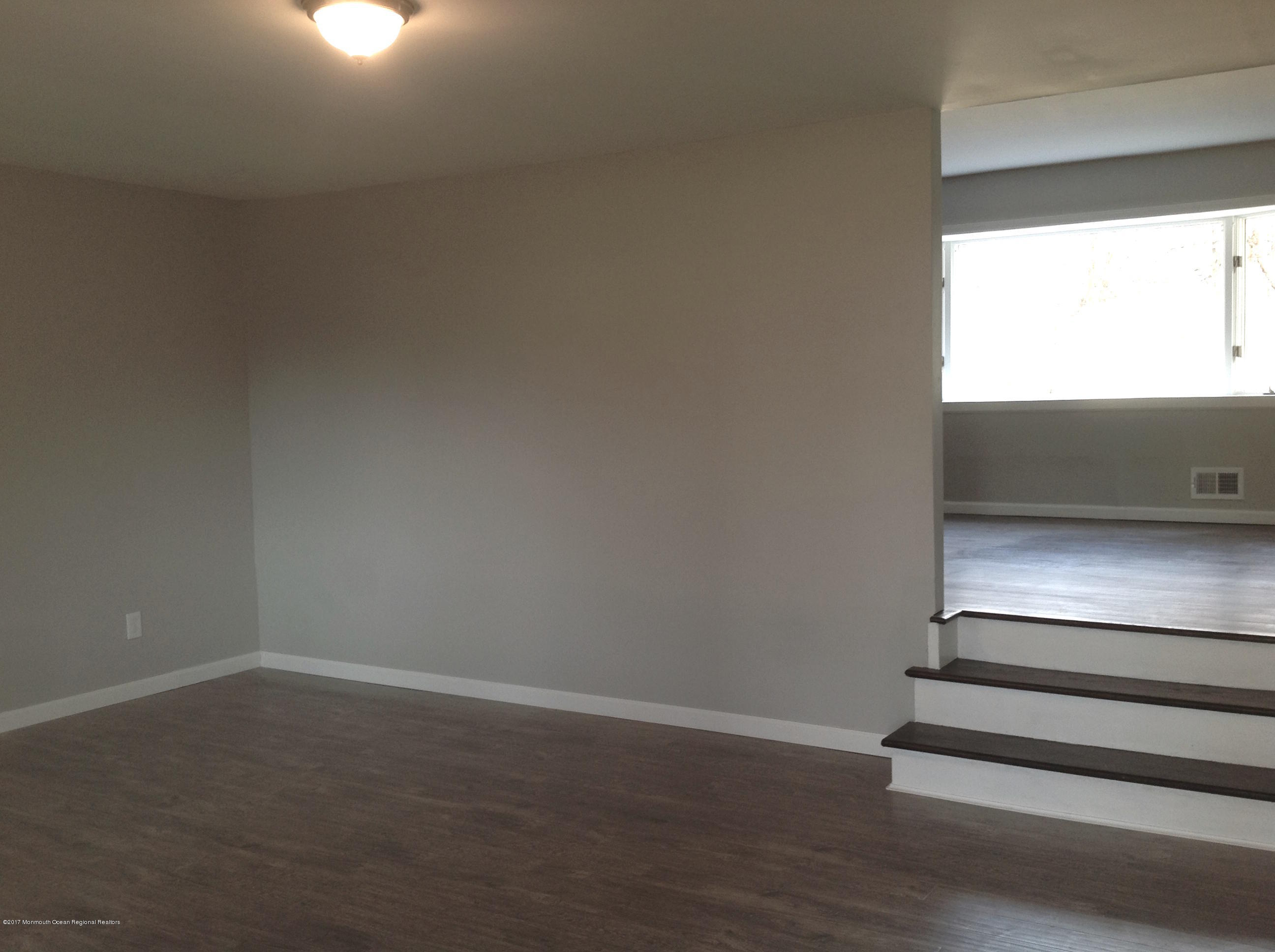 10 Carriage Road North Hazlet, NJ 07730 - Photo 3 of 24 a empty room with a window
