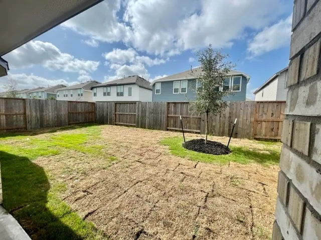 a house with yard in front of it