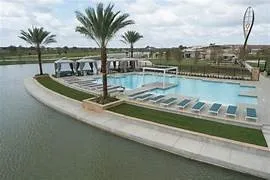 a view of a swimming pool with an outdoor space