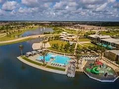 a view of a lake with a big yard