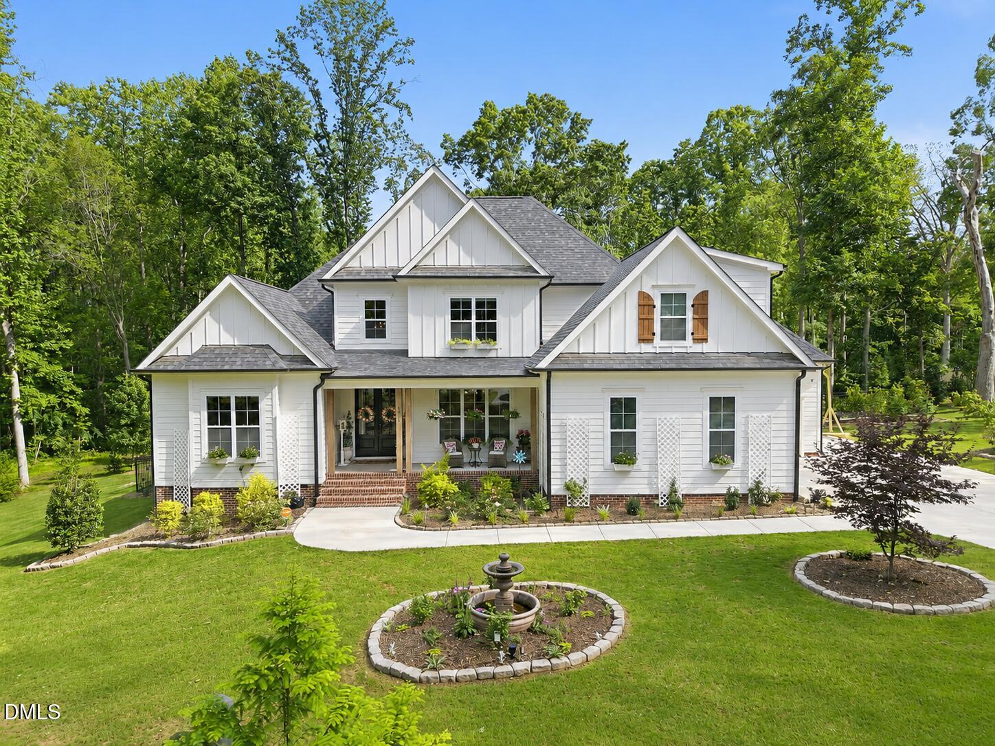 3511 Bruce Garner Road Wake Forest, NC 27587 - Photo 55 of 56 a front view of a house with a yard