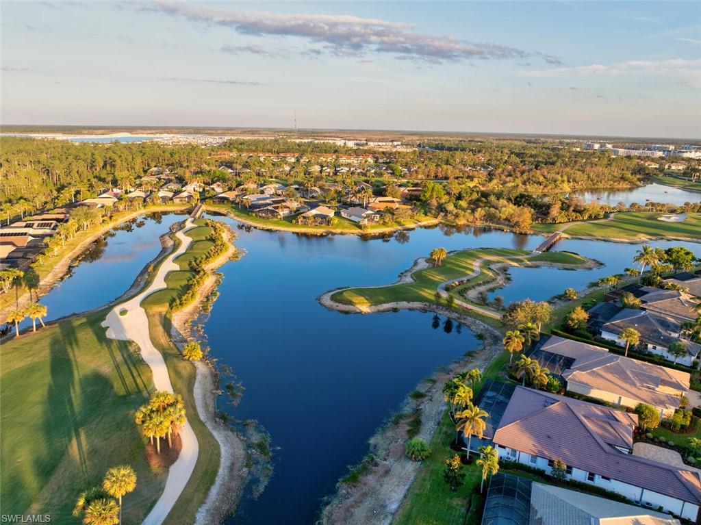 5044 Castlerock Way Naples, FL 34112 - Photo 1 of 38 an aerial view of residential houses with outdoor space