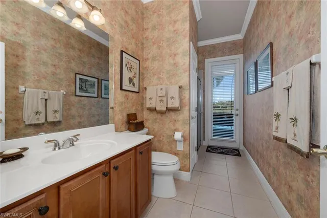 a spacious bathroom with a sink a toilet and shower