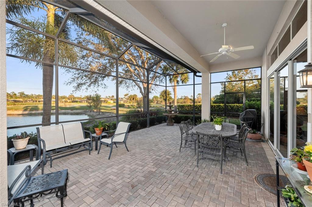 5044 Castlerock Way Naples, FL 34112 - Photo 18 of 38 a building outdoor space with patio furniture and garden