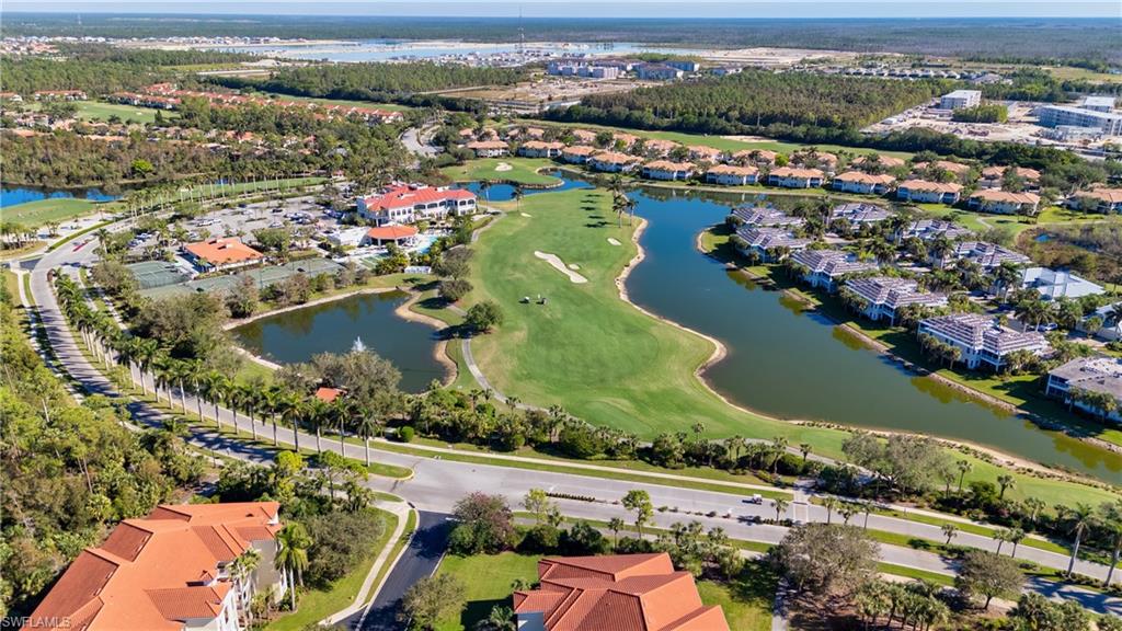 5044 Castlerock Way Naples, FL 34112 - Photo 25 of 38 an aerial view of a city