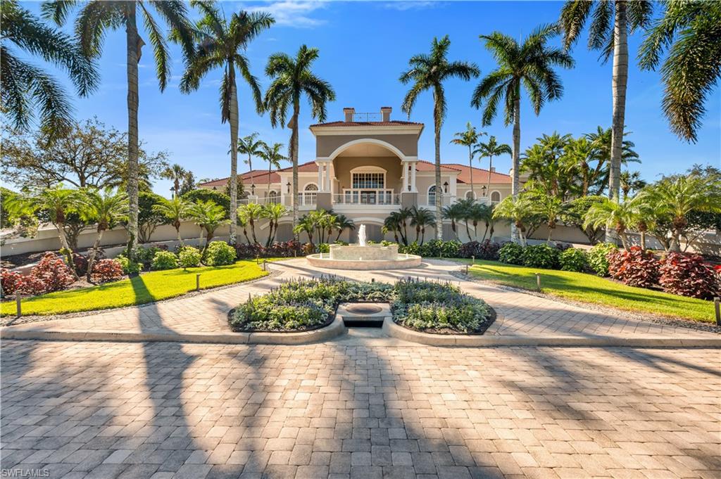 5044 Castlerock Way Naples, FL 34112 - Photo 28 of 38 a view of swimming pool with a garden