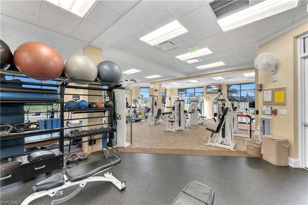 5044 Castlerock Way Naples, FL 34112 - Photo 31 of 38 a view of a room with gym equipment