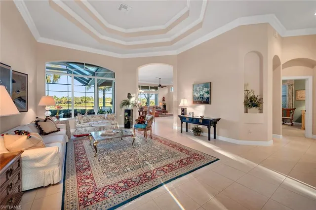 a living room with furniture and a table
