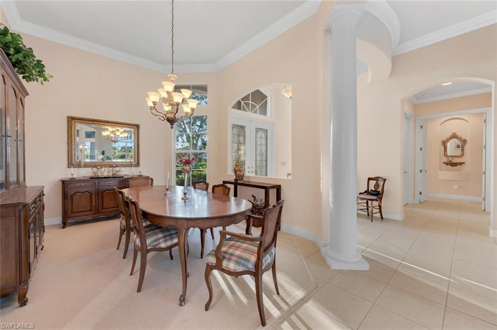 5044 Castlerock Way Naples, FL 34112 - Photo 9 of 38 a dining room with furniture and window