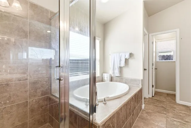 a bathroom with sink and mirror