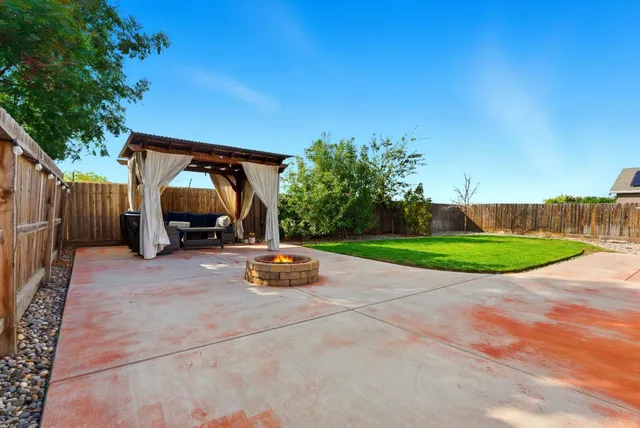 a view of a backyard with a garden