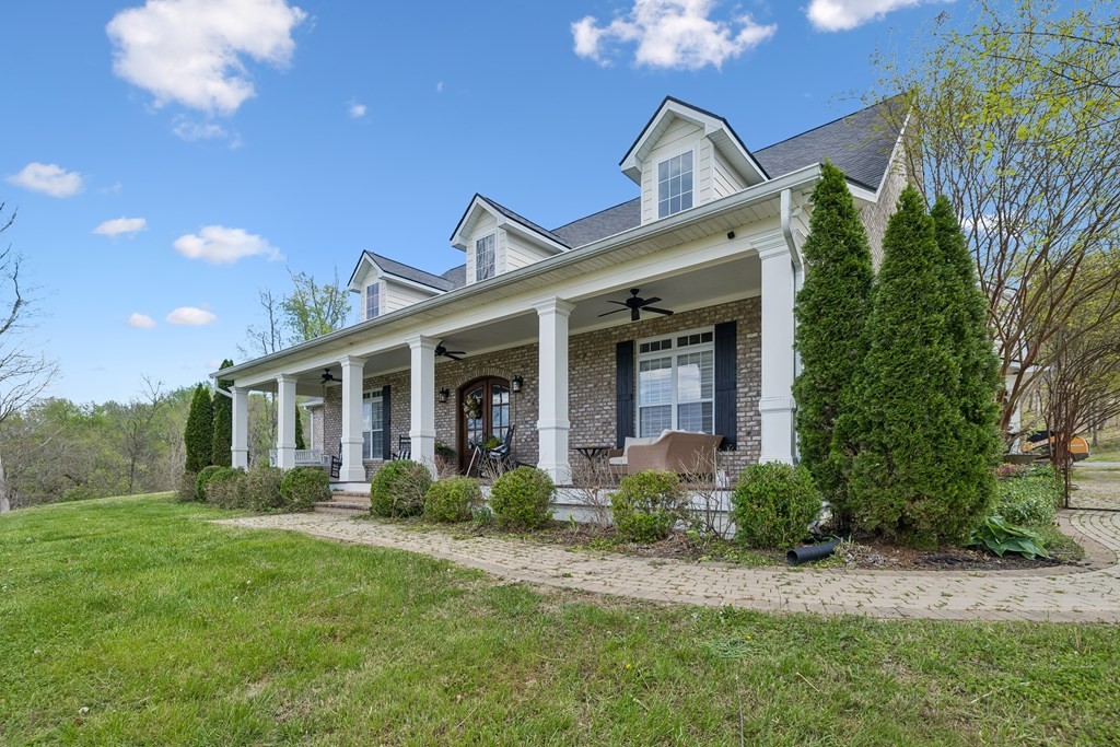 3631 Louisville Road Louisville, TN 37777 - Photo 2 of 64 a view of a house with a big yard and potted plants