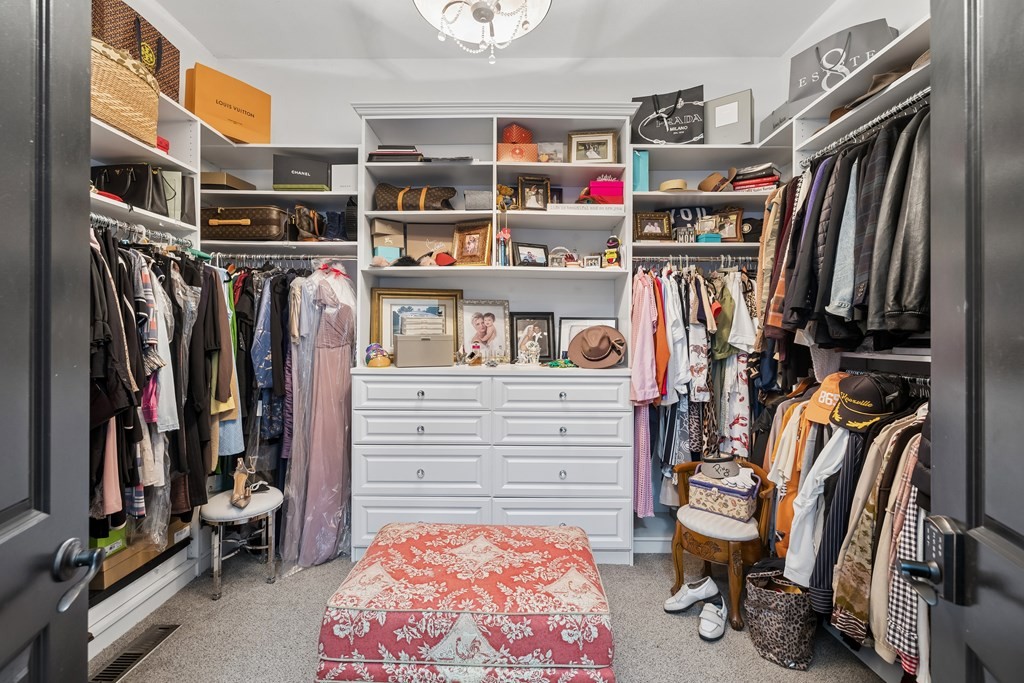 3631 Louisville Road Louisville, TN 37777 - Photo 22 of 64 a view of walk in closet with clothes and shoes