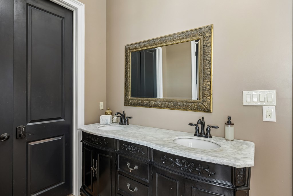 3631 Louisville Road Louisville, TN 37777 - Photo 26 of 64 a bathroom with a granite countertop sink and a mirror