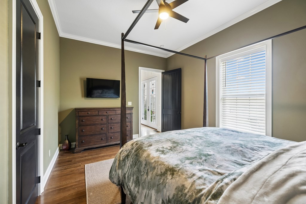 3631 Louisville Road Louisville, TN 37777 - Photo 29 of 64 a bedroom with a bed and a flat screen tv