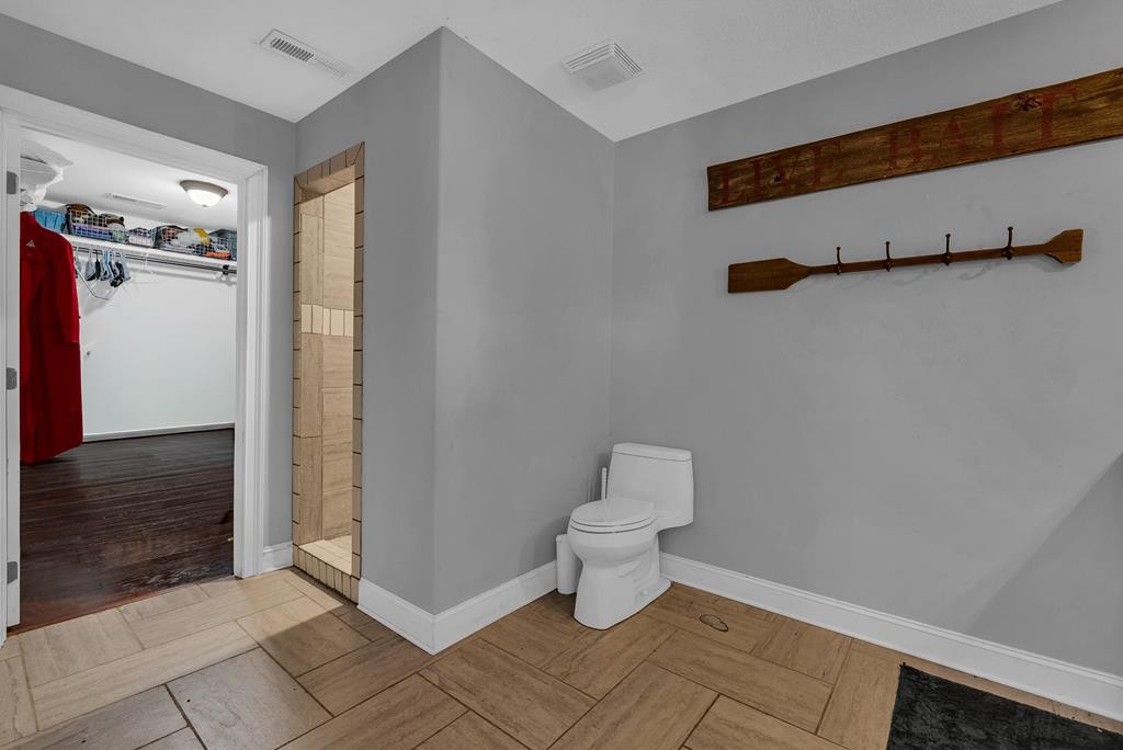 3631 Louisville Road Louisville, TN 37777 - Photo 36 of 64 a bathroom with a toilet and a shower