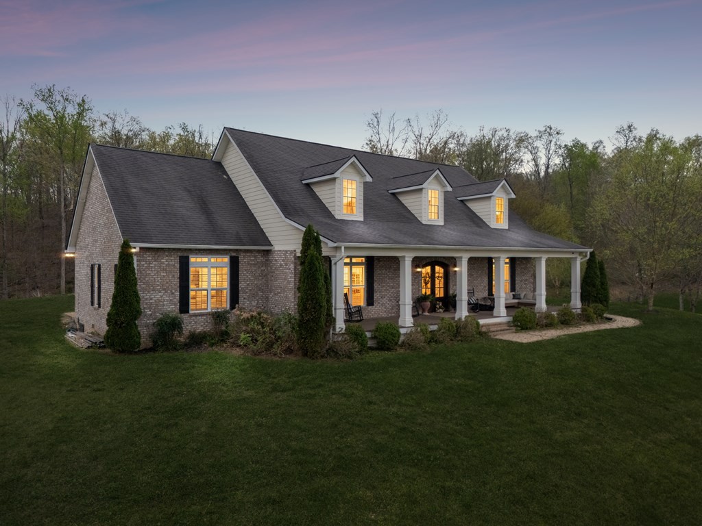 3631 Louisville Road Louisville, TN 37777 - Photo 51 of 64 a front view of a house with a garden