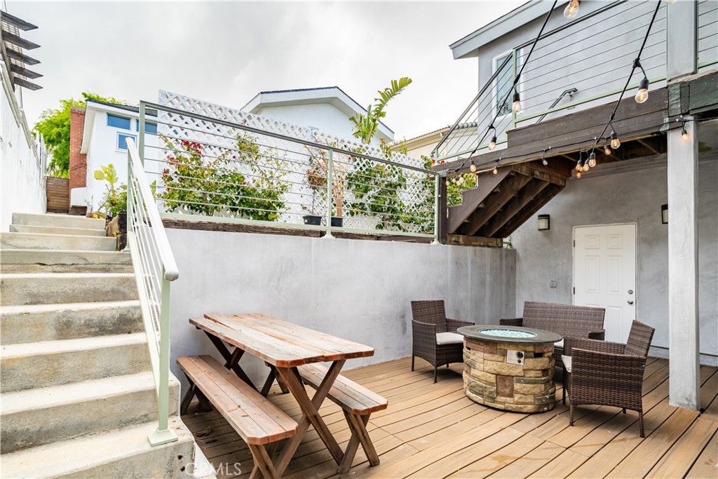 357 Whiting Street El Segundo, CA 90245 - Photo 35 of 50 a roof deck view with table and chairs