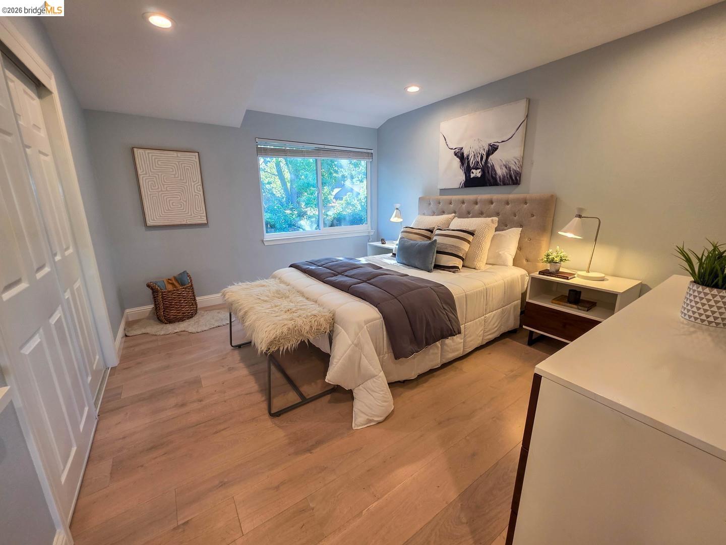965 Springer Road Los Altos, CA 94024 - Photo 24 of 31 Light wood-finish flooring complements the neutral wall color and recessed lighting