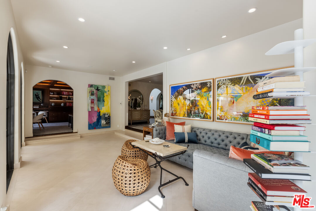 1109 Tower Road Beverly Hills, CA 90210 - Photo 16 of 32 a living room with furniture and a rug
