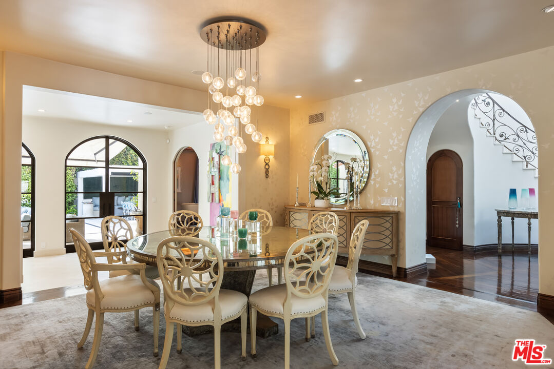 1109 Tower Road Beverly Hills, CA 90210 - Photo 18 of 32 a view of a dining room with furniture
