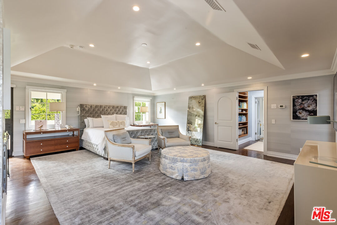 1109 Tower Road Beverly Hills, CA 90210 - Photo 22 of 32 a living room with furniture and a wooden floor