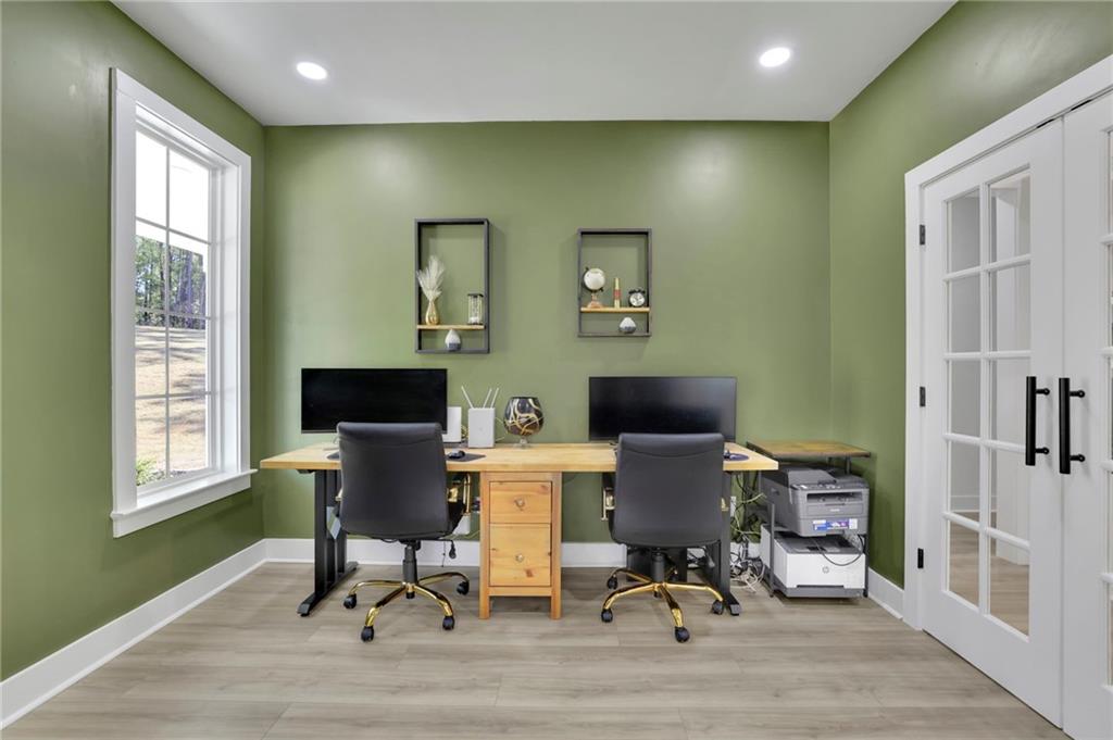 1610 Double Springs Church Road Monroe, GA 30656 - Photo 20 of 81 a workspace with furniture hardwood and a window