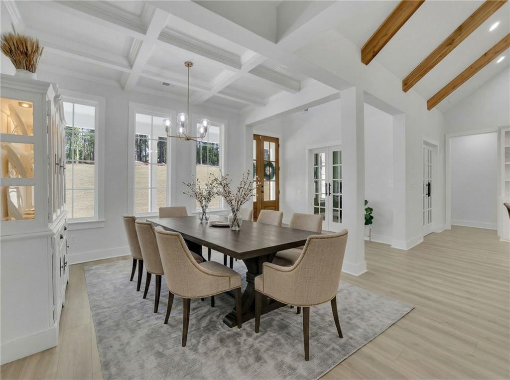 1610 Double Springs Church Road Monroe, GA 30656 - Photo 37 of 81 a view of a dining room with furniture and chandelier