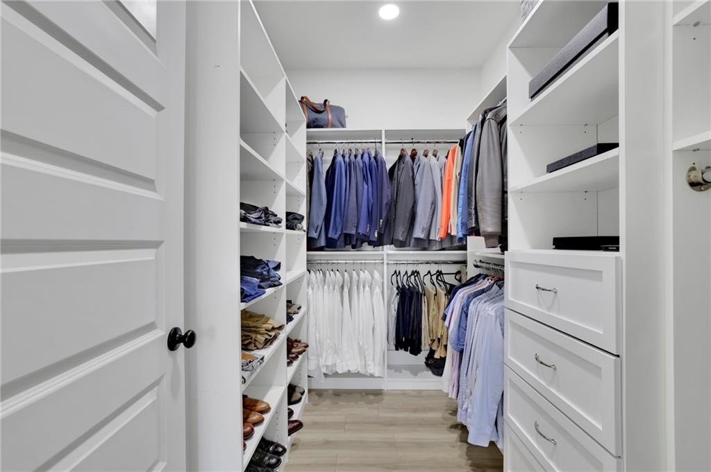 1610 Double Springs Church Road Monroe, GA 30656 - Photo 47 of 81 a view of walk in closet with clothes and shoes