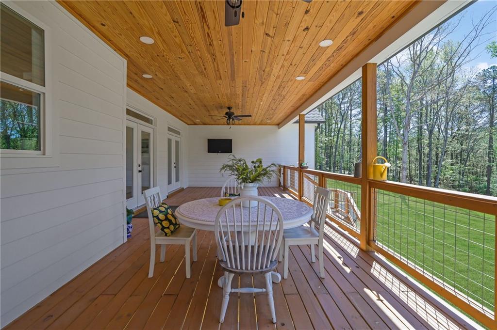 1610 Double Springs Church Road Monroe, GA 30656 - Photo 56 of 81 a view of a patio with a table chairs and a patio