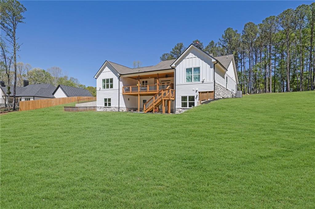 1610 Double Springs Church Road Monroe, GA 30656 - Photo 76 of 81 a front view of a house with a yard and porch