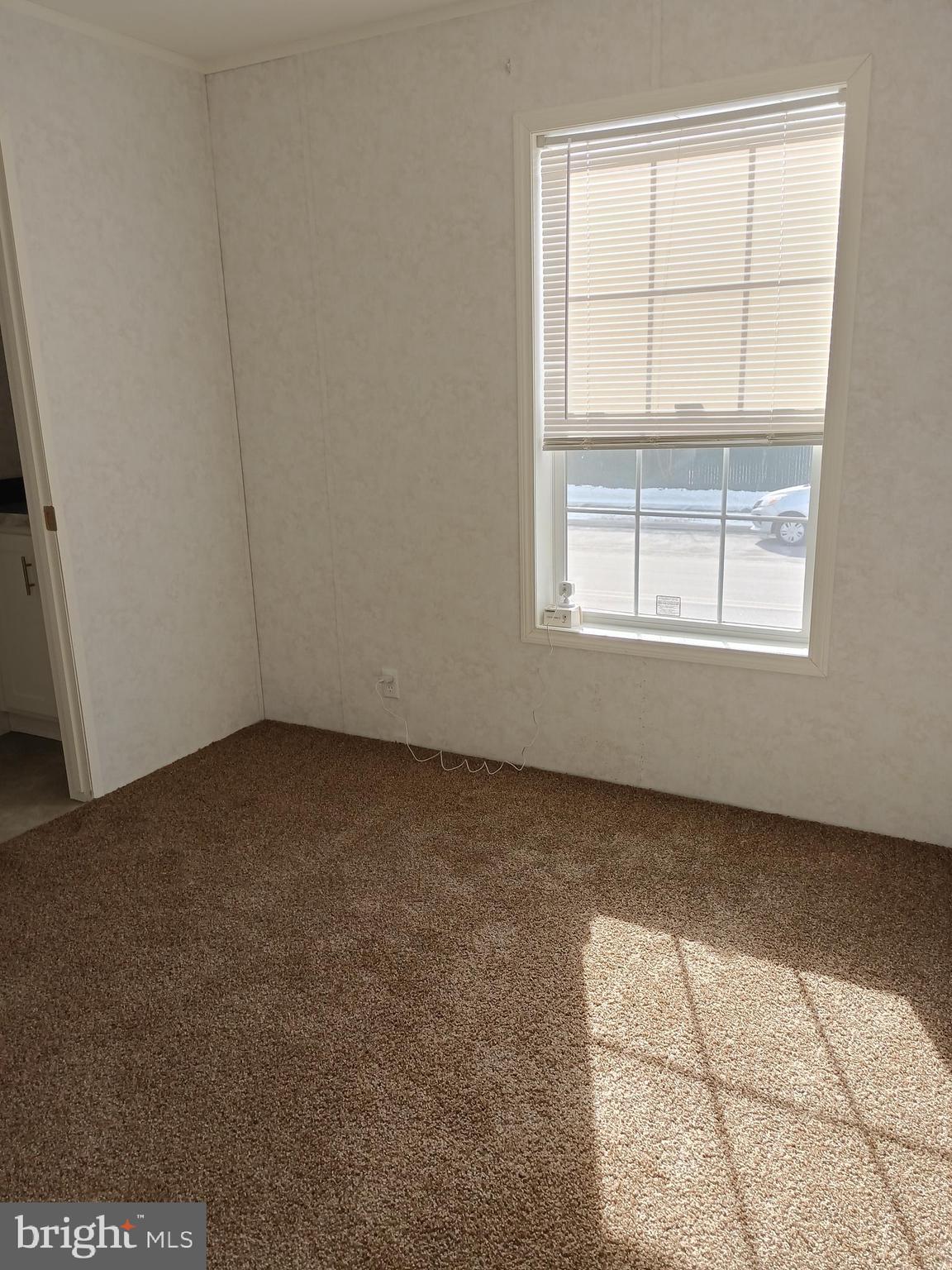 1405 Farrell Avenue, Unit 341 Cherry Hill, NJ 08002 - Photo 11 of 20 an empty room with a window