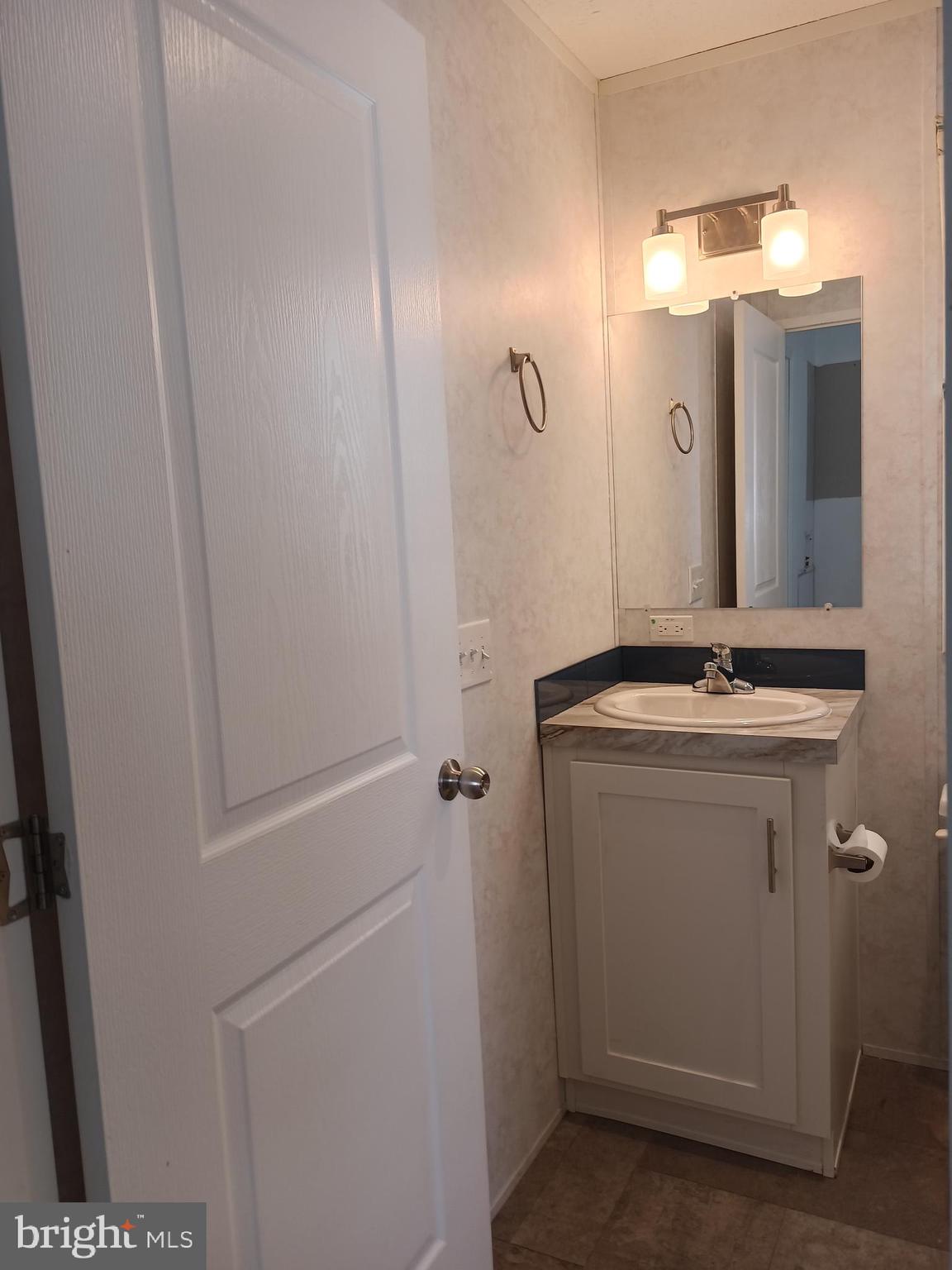 1405 Farrell Avenue, Unit 341 Cherry Hill, NJ 08002 - Photo 13 of 20 a bathroom with a sink a toilet and shower