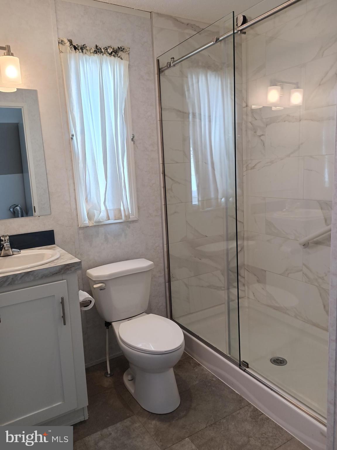 1405 Farrell Avenue, Unit 341 Cherry Hill, NJ 08002 - Photo 14 of 20 a bathroom with a toilet and a shower