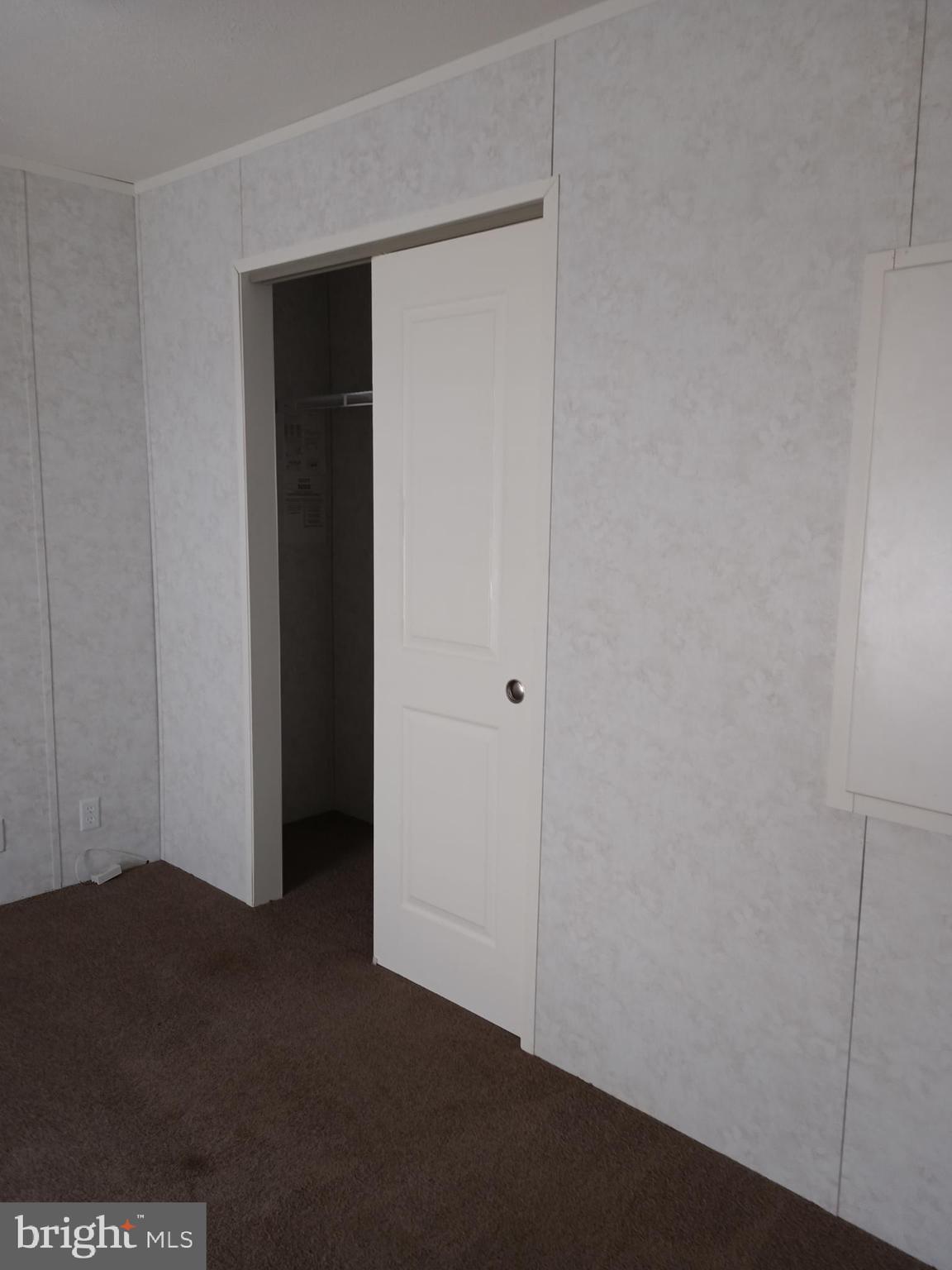 1405 Farrell Avenue, Unit 341 Cherry Hill, NJ 08002 - Photo 19 of 20 an empty room with a closet