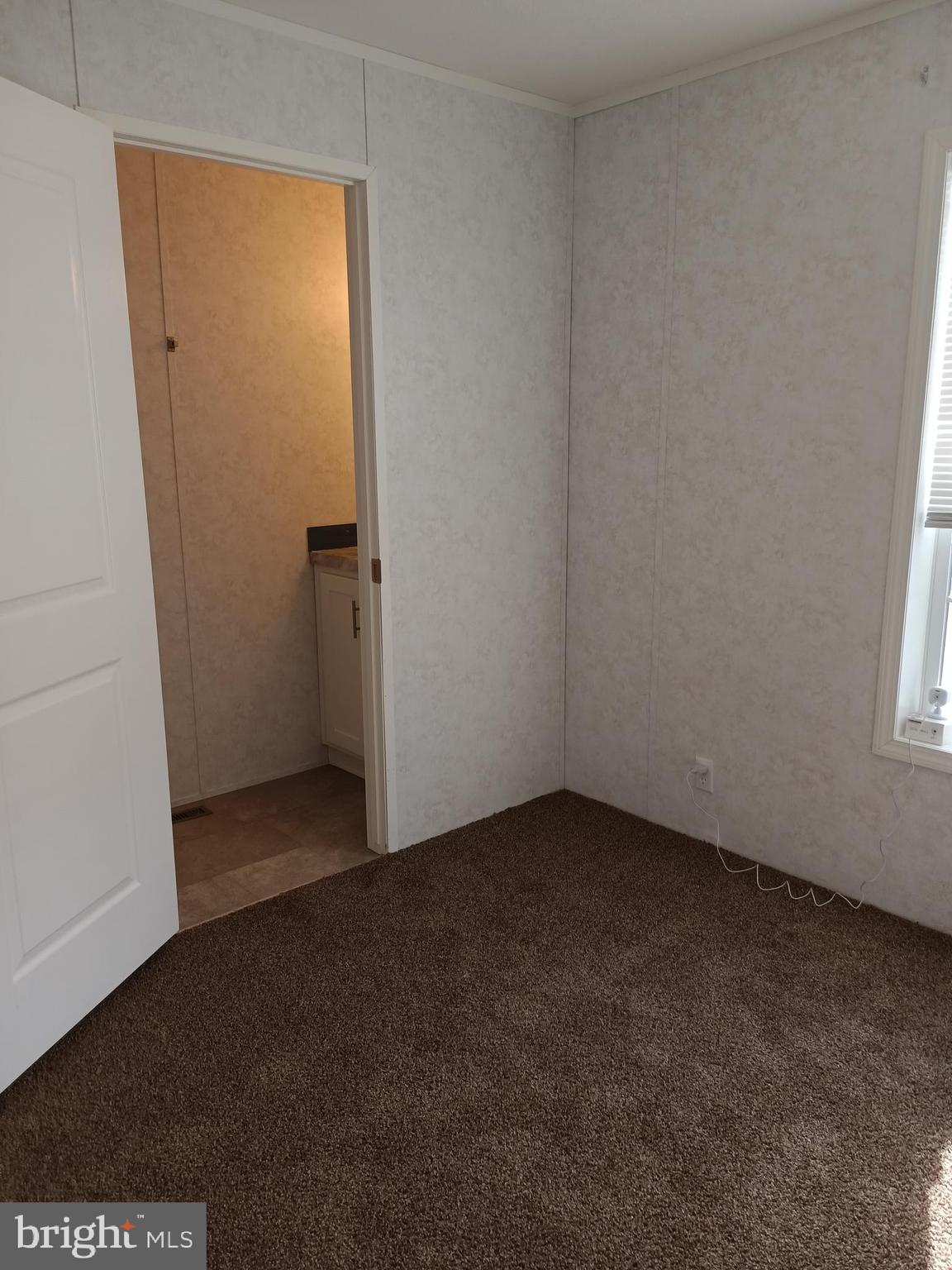 1405 Farrell Avenue, Unit 341 Cherry Hill, NJ 08002 - Photo 10 of 20 an empty room with windows