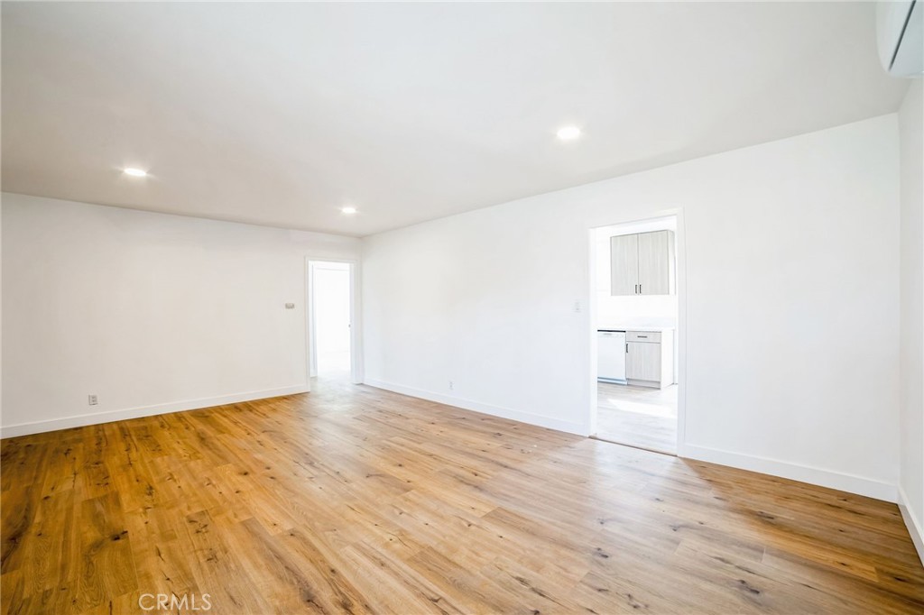 2746 Prospect Avenue Riverside, CA 92507 - Photo 4 of 10 a view of empty room with wooden floor