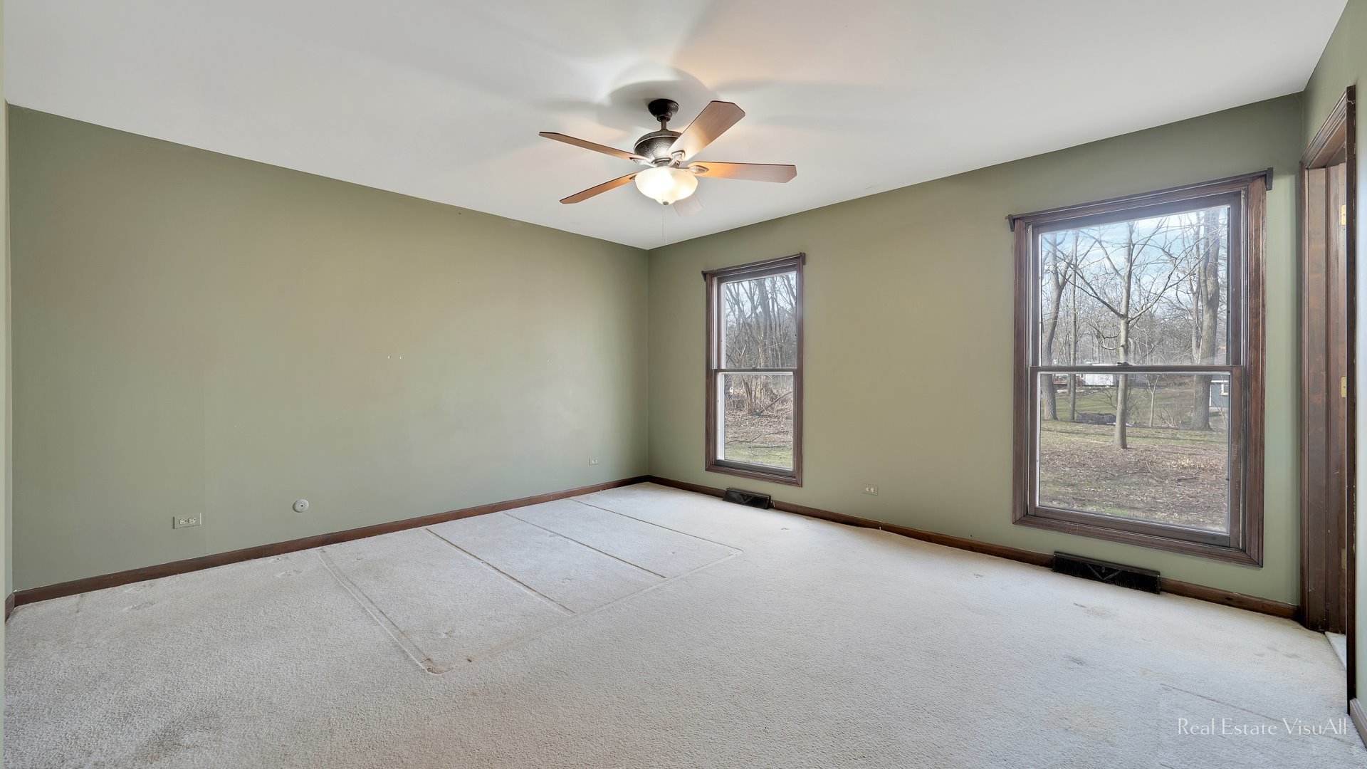 5-n994 Corron Road St. Charles, IL 60175 - Photo 16 of 39 an empty room with chandelier fan and windows