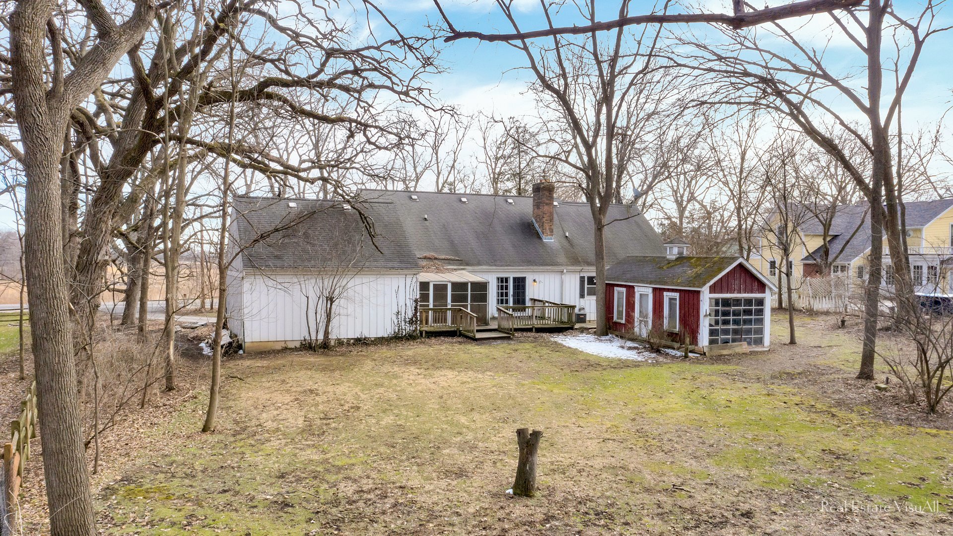 5-n994 Corron Road St. Charles, IL 60175 - Photo 23 of 39 a view of a house with large tree and wooden fence
