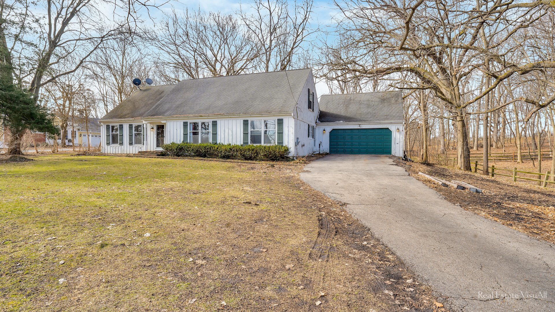 5-n994 Corron Road St. Charles, IL 60175 - Photo 3 of 39 a front view of house with yard and trees around