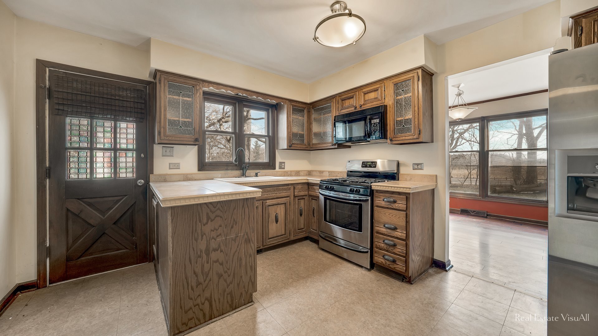 5-n994 Corron Road St. Charles, IL 60175 - Photo 9 of 39 a kitchen with a sink and a stove top oven