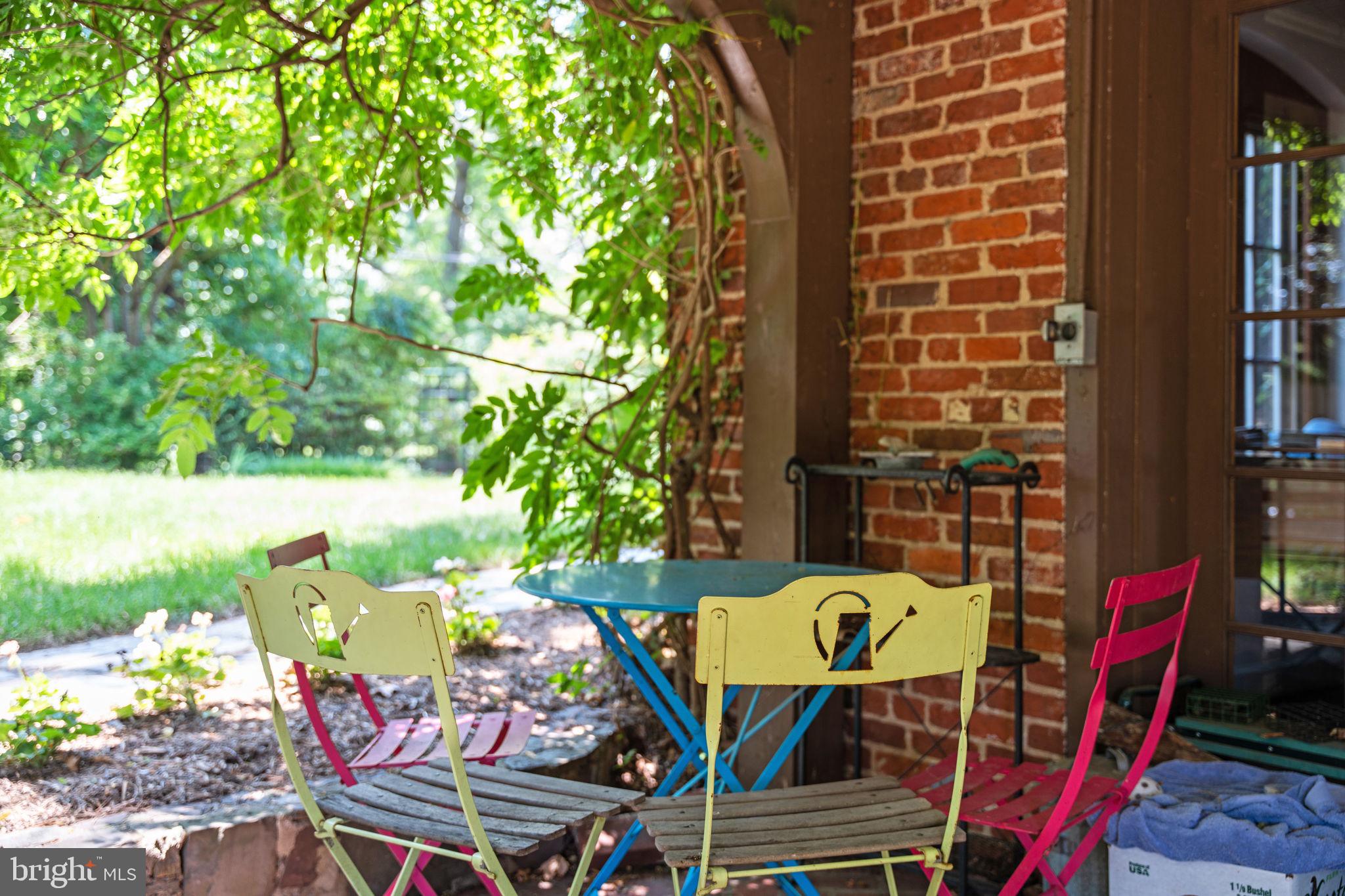 3111 Idaho Avenue Northwest Washington, DC 20016 - Photo 35 of 40 a view of a chairs and table in patio