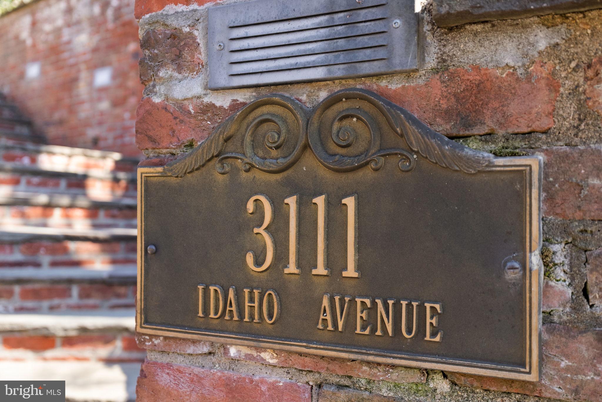 3111 Idaho Avenue Northwest Washington, DC 20016 - Photo 40 of 40 a sign broad on a brick wall