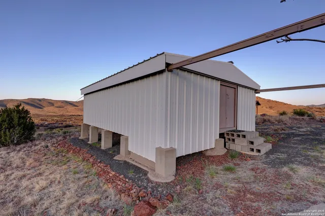 a view of a house with a mountain