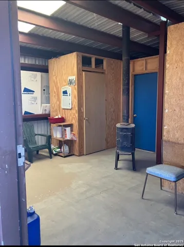 a view of a backyard of the house