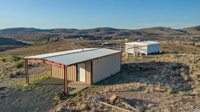 a view of a glass door with a balcony