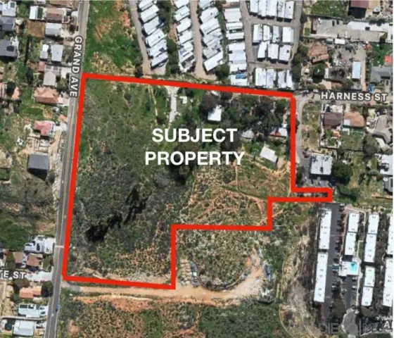 a street sign that is sitting in front of flowers