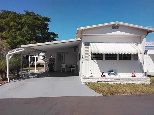 a front view of a house with garage